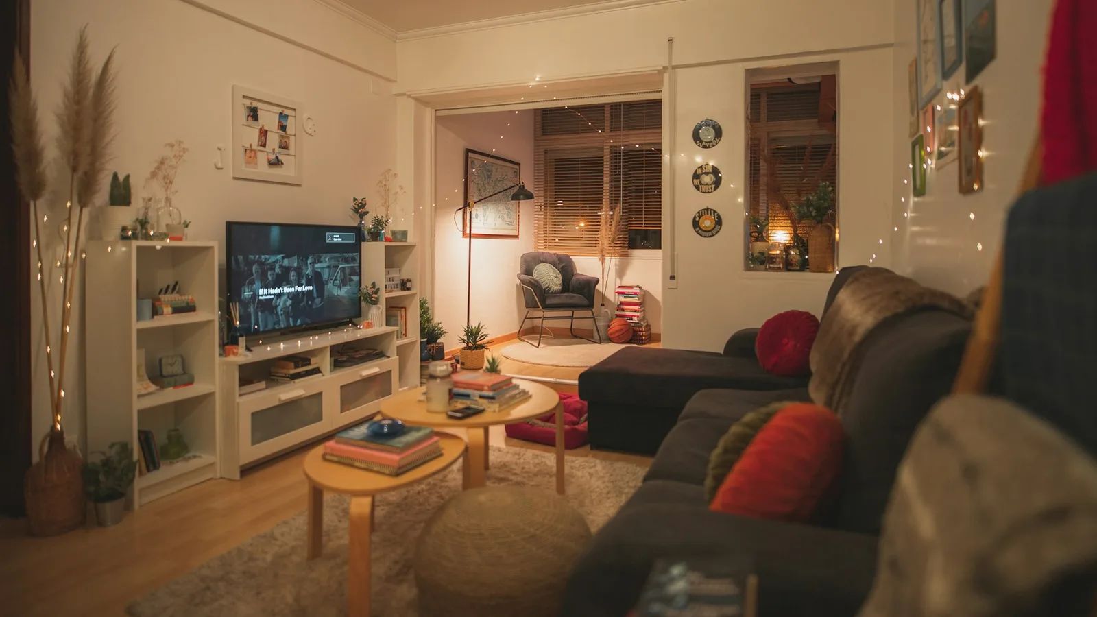 Bright living room with a television, sofa and coffee table